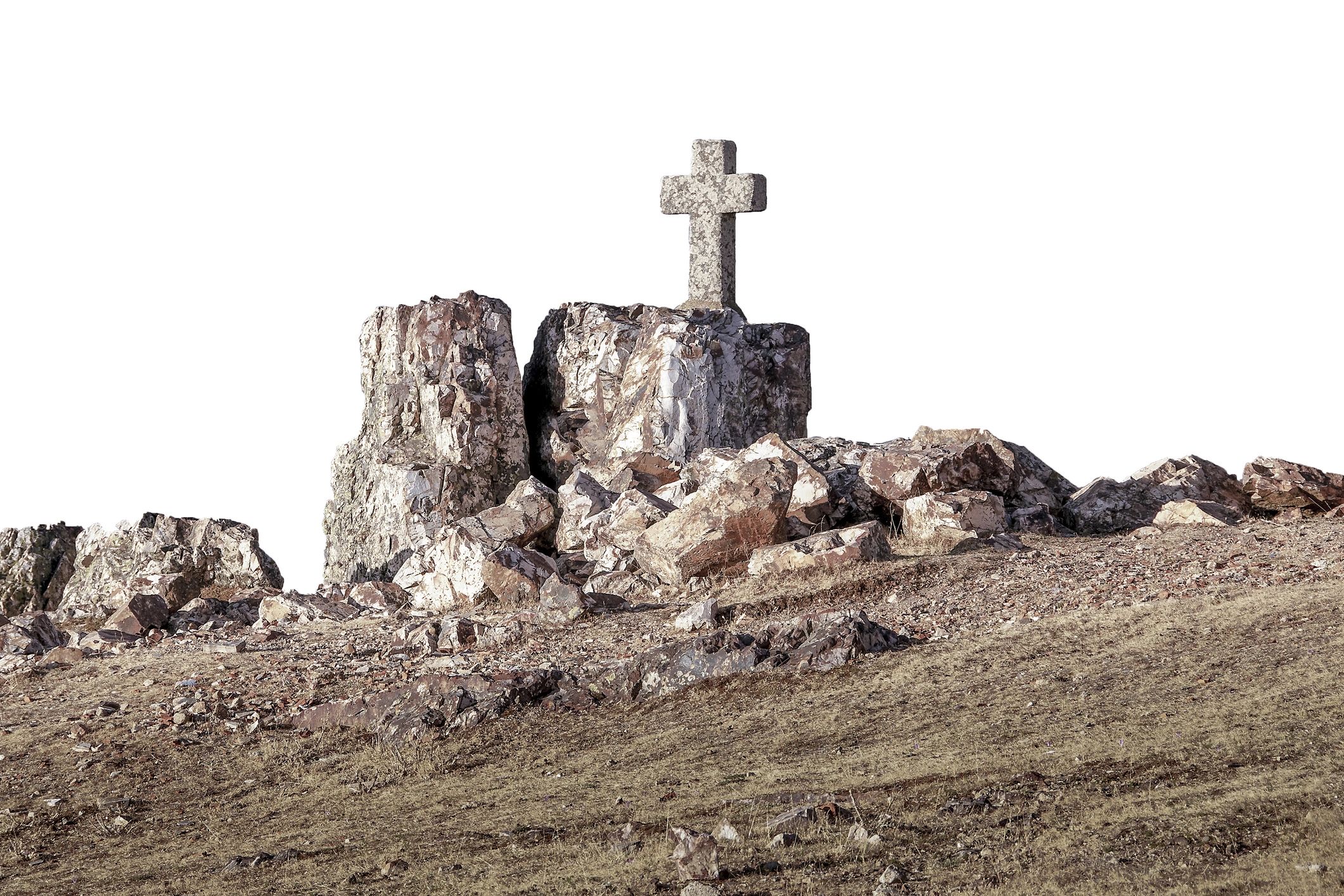Stone cross monument on a mountain summit
